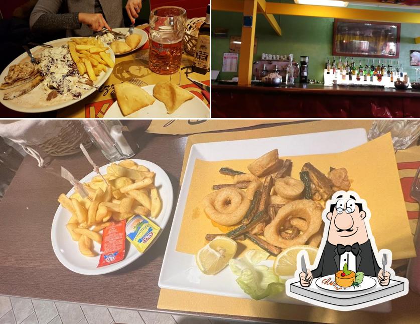 Tra le diverse cose da Pizzeria Klaxon si possono trovare la cibo e interni