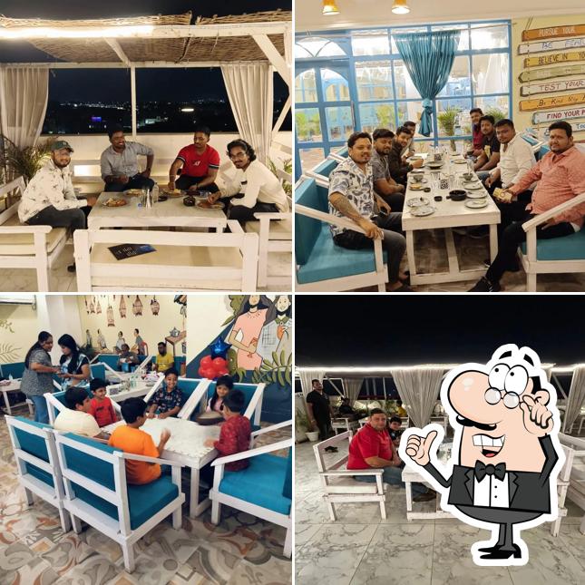 Take a seat at one of the tables at K Lounge