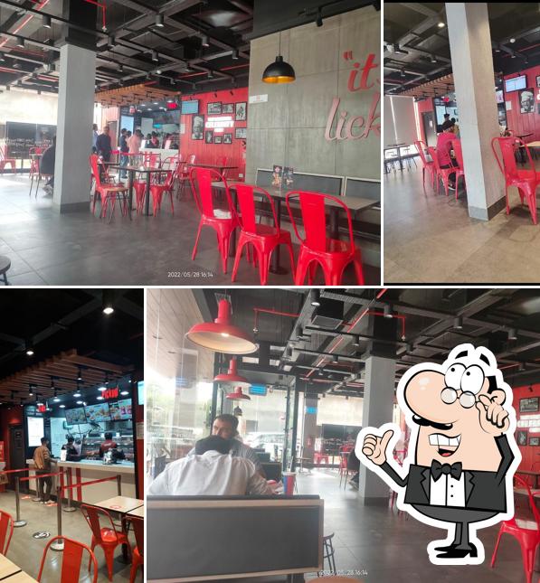 Take a seat at one of the tables at KFC