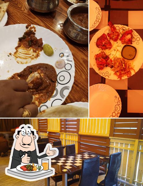 Among various things one can find food and interior at Tandoor House Restaurant