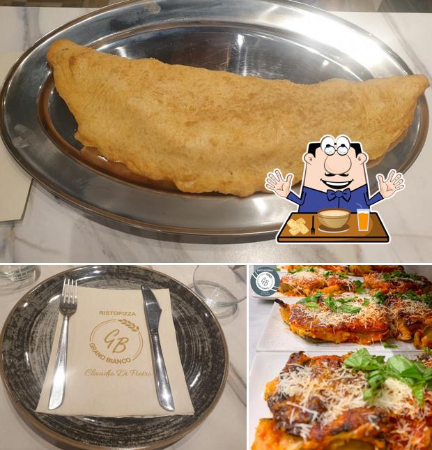 Pizzeria Grano Bianco si caratterizza per la cibo e bevanda