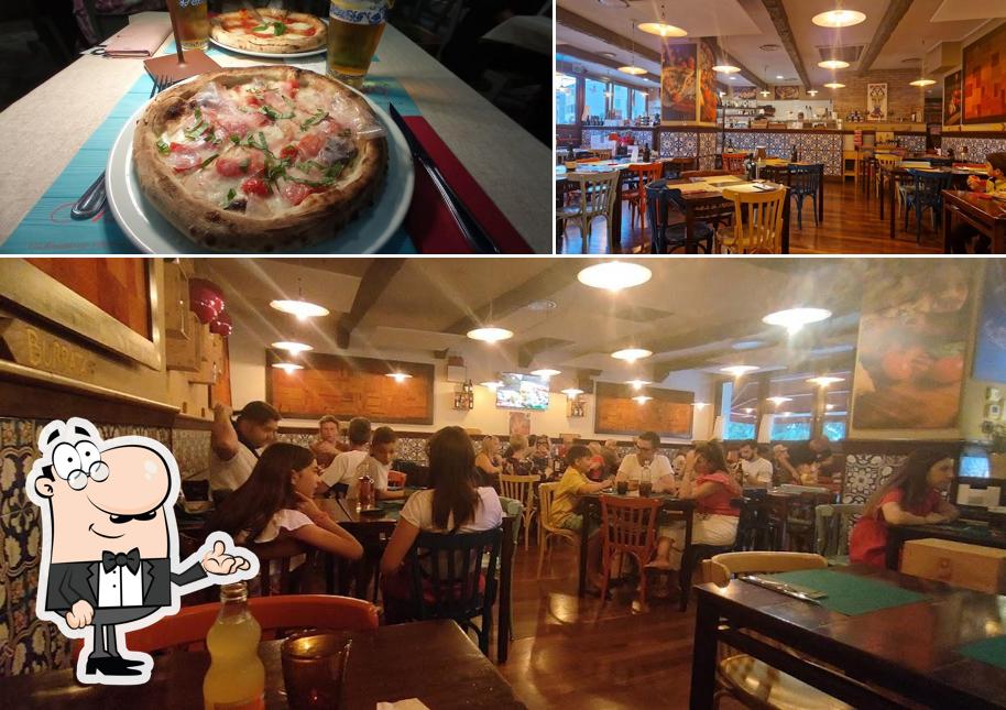 Siediti a un tavolo di PIZZERIA ASSO DE COPE