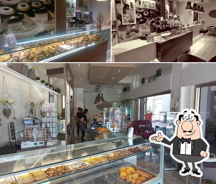 Dai un'occhiata agli interni di Pasticceria Caffetteria Dolce Caffè
