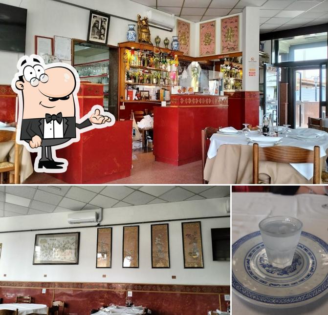 Guarda la immagine che mostra la interni e bevanda di Ristorante Cinese Wah Pei