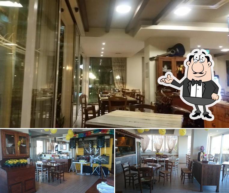 Dai un'occhiata agli interni di Ristorante Osteria Urbini