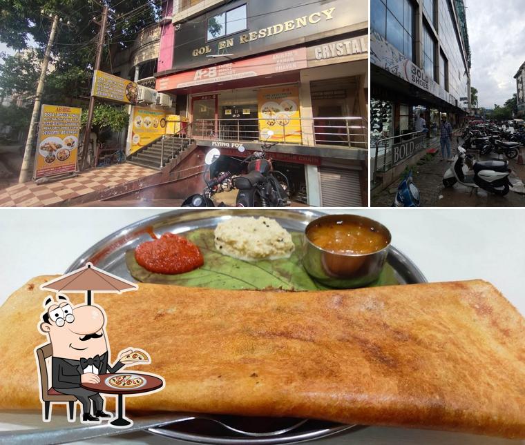 The photo of AB Pure Vegetarian Restaurant’s exterior and food