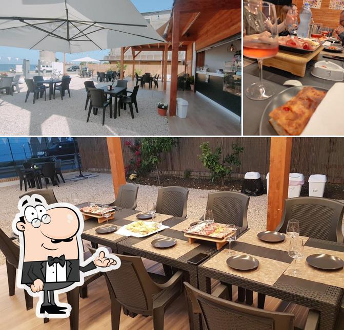 Questa è la foto che mostra la interni e cibo di Beach Stop
