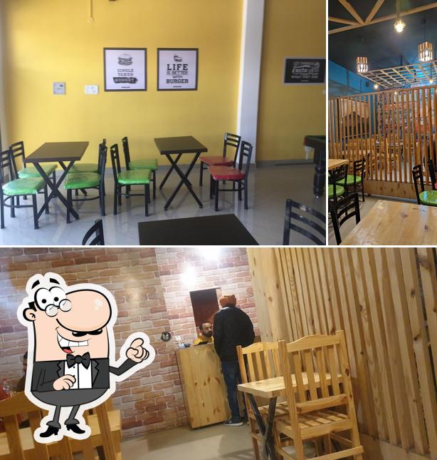 Take a seat at one of the tables at Burger Bite ਬਰਗਰ ਵਾਇट