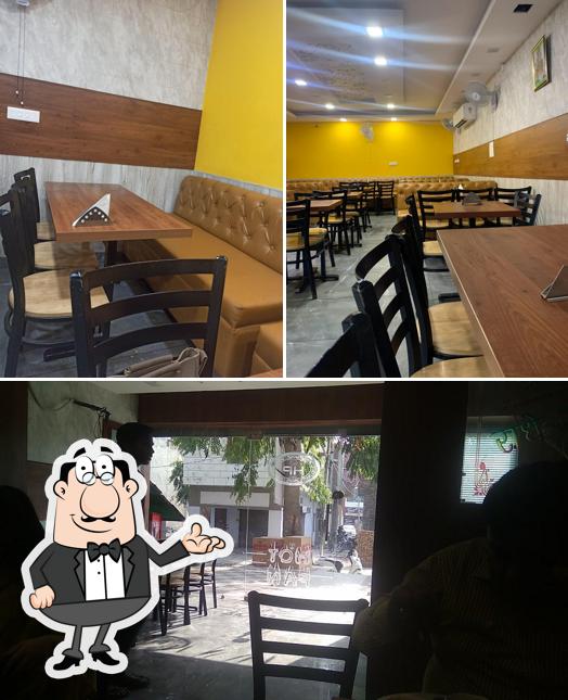 Take a seat at one of the tables at Hot Pan