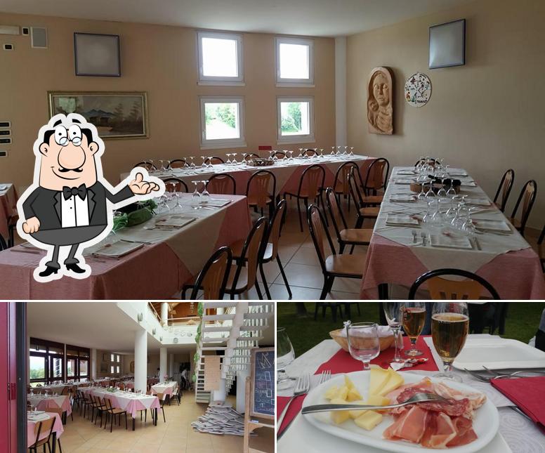 Dai un'occhiata agli interni di Trattoria L'Oasi