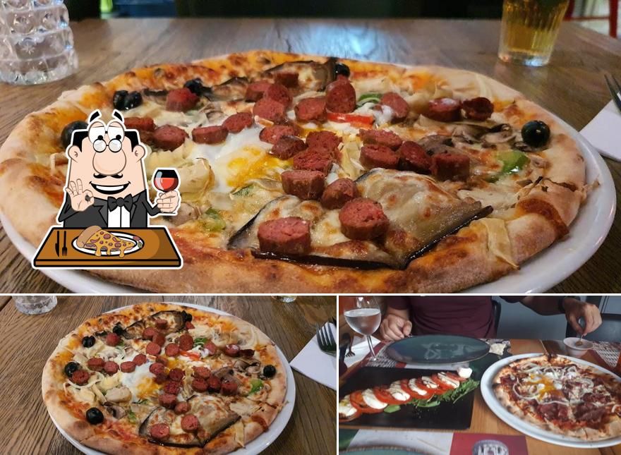 A Pizzeria Pasta Calabria, vous pouvez prendre des pizzas