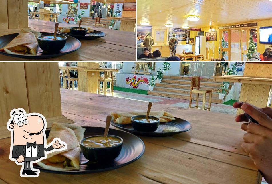 Take a seat at one of the tables at Smakme Cafe