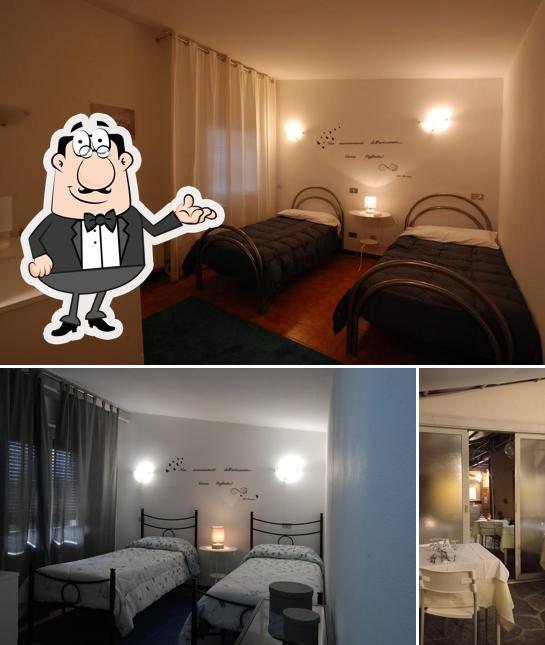 Siediti a un tavolo di Hotel Ristorante Pizzeria Campagna