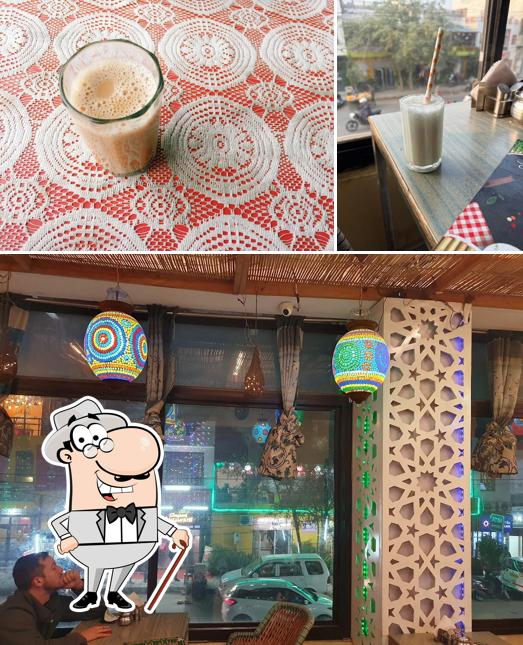 The photo of Bamboo Cafe’s exterior and beverage