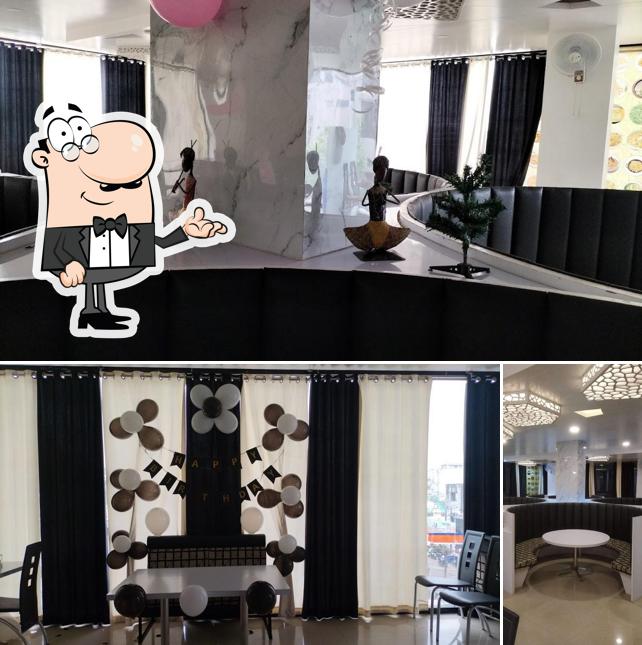 Check out how Atmosphere Pure Veg Restaurant & Cafe looks inside
