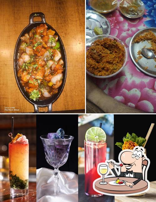 Take a look at the image showing food and alcohol at Ar Kitchen King