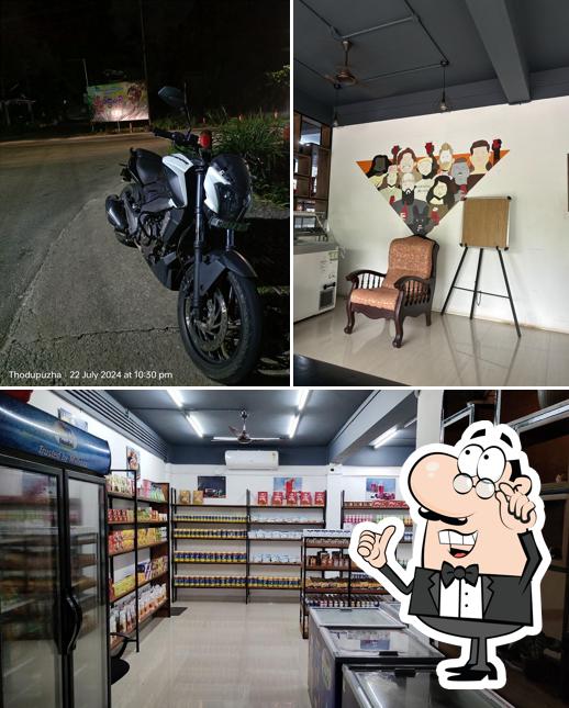 Check out the photo depicting interior and exterior at Nandini Cafemoo
