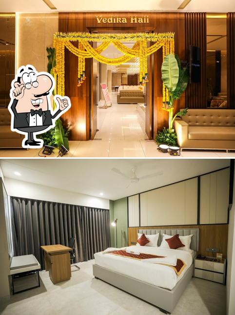 Take a seat at one of the tables at HOTEL SVM GRAND DAIRY FARM ROAD