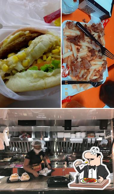 O Pit Stop Lanches se destaca pelo comida e interior
