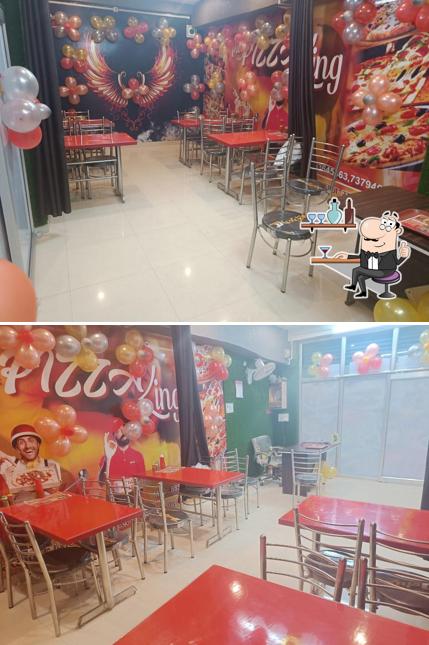The interior of The hot pizza king