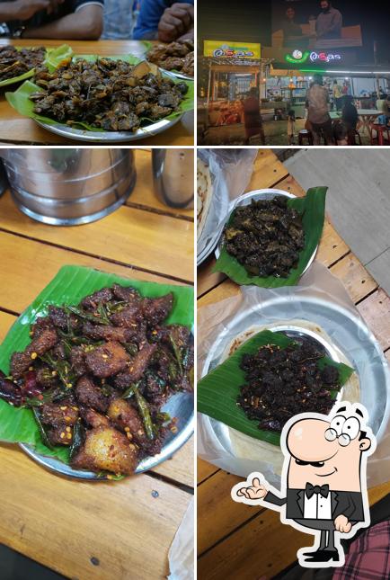 This is the image displaying interior and food at മോഹനേട്ടന്റെ തട്ടുകട (Mohanettante Thattukada)