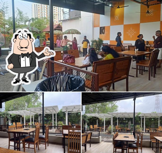 Take a seat at one of the tables at Ruchika Restaurant