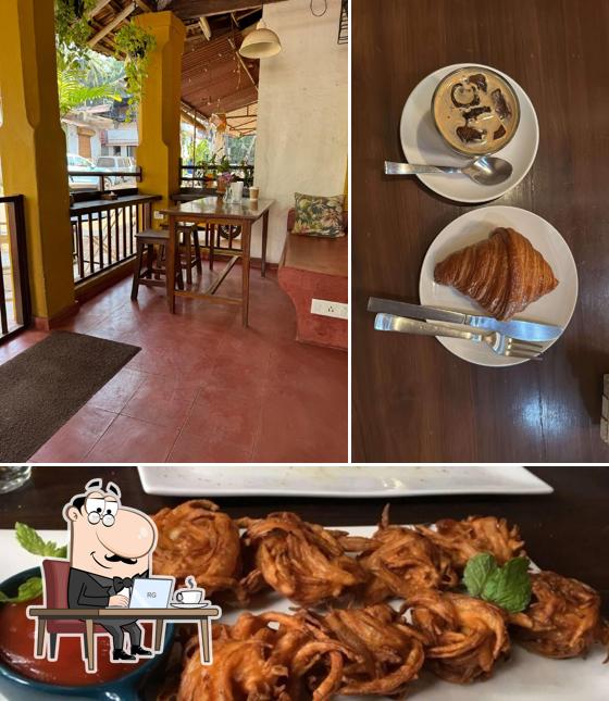 Check out the picture showing interior and food at The Rice Mill