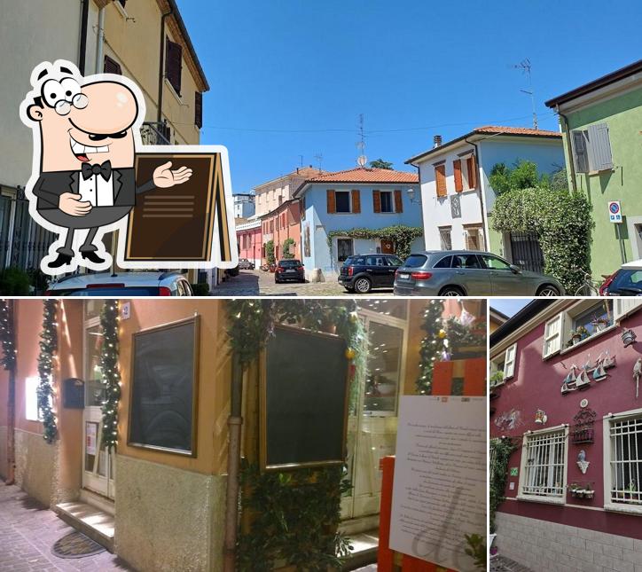 La foto della esterno e lavagna di Osteria de Borg