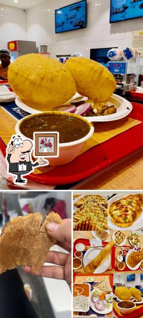 Take a seat at one of the tables at Haldiram's