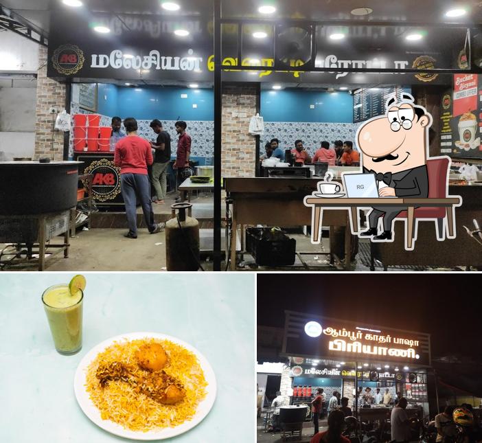 Check out the photo depicting interior and beverage at Ambur Kadhar Basha Briyani