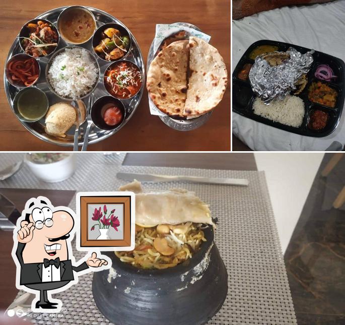 Check out the picture showing interior and beverage at Chulha A Homely Dip