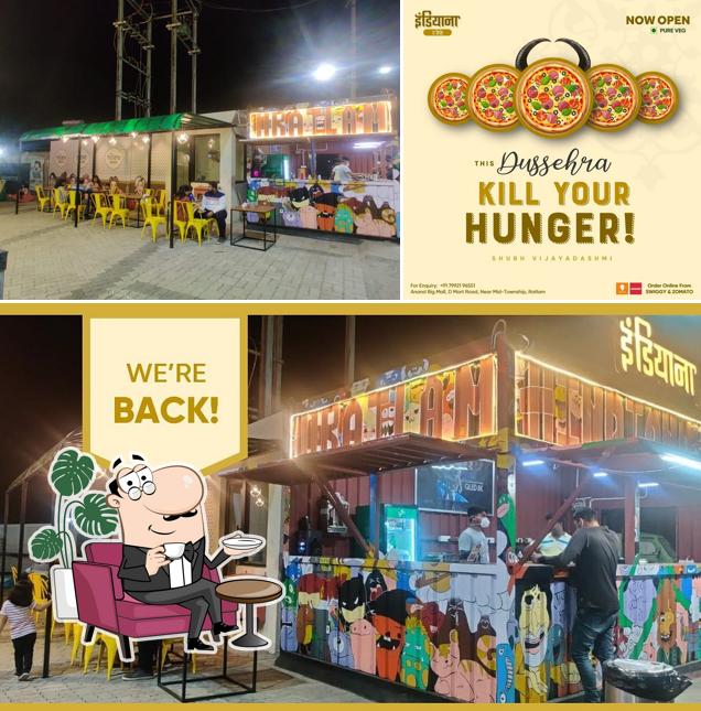 Check out the image depicting interior and food at Indiana The Café