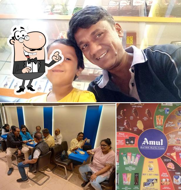 Take a seat at one of the tables at Sejals Amul Foodland