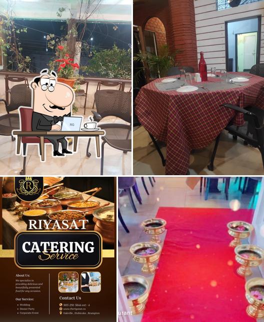 Take a seat at one of the tables at Riyasat Restaurant and cafe
