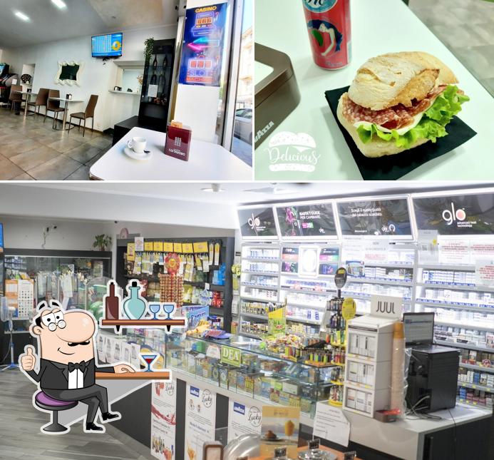 Questa è la immagine che mostra la interni e cibo di IQOS PARTNER - Bar Tabacchi Lucky, Torino Vape Store RELX - WAKA - ELFBAR - PULZE - GLO - Punto Poste Amazon Hub