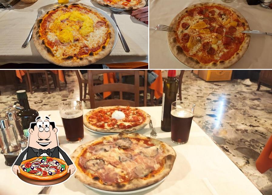 A Pizzeria Trattoria Olivi, puoi goderti una bella pizza