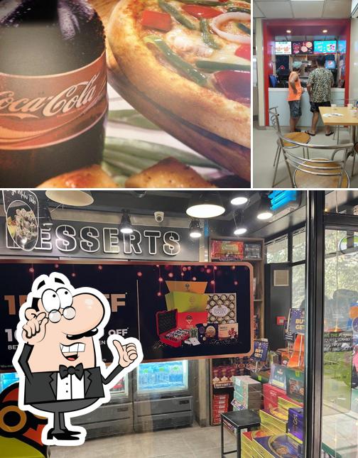 Domino's Pizza is distinguished by interior and beverage
