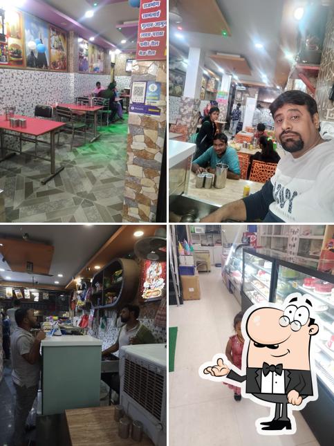 Take a seat at one of the tables at Happy sweets