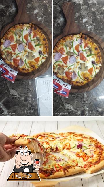 Get pizza at Jolly tadka