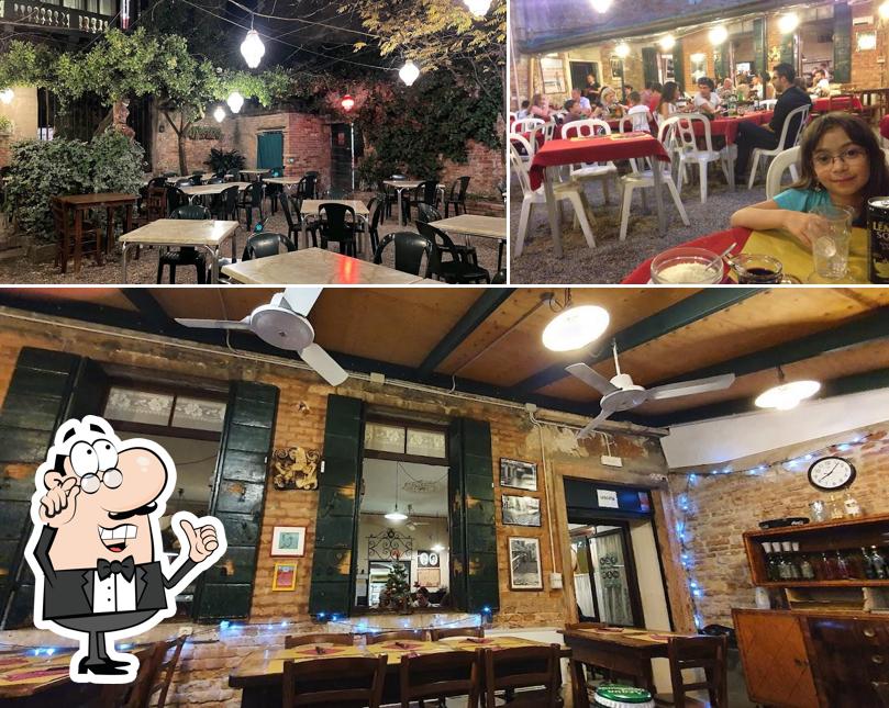 Siediti a un tavolo di Osteria Trattoria Al Nono Risorto