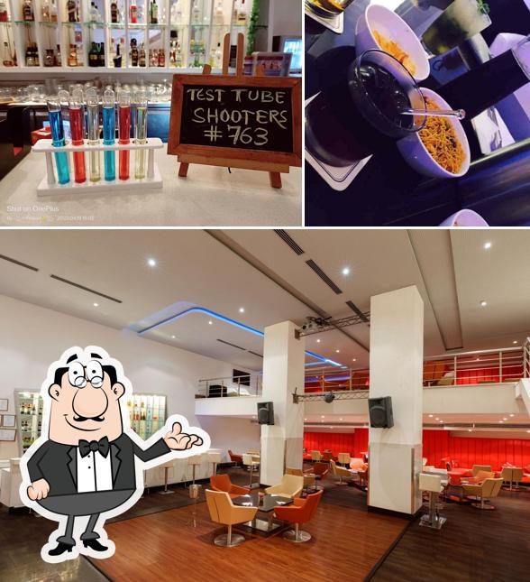 Take a look at the picture depicting interior and food at Swizzle