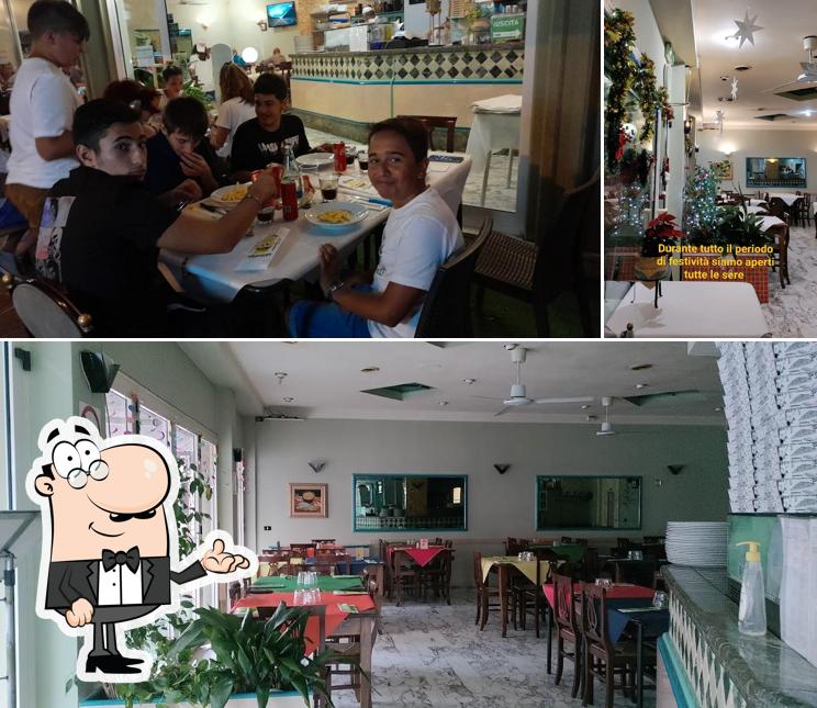 Dai un'occhiata agli interni di Pizzeria Ristorante Rouge Noir