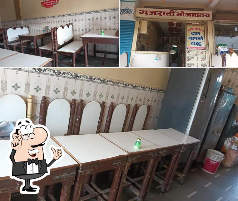 Take a seat at one of the tables at Gujrati Bhojnalaya
