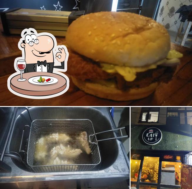 This is the image displaying food and exterior at Eat Up