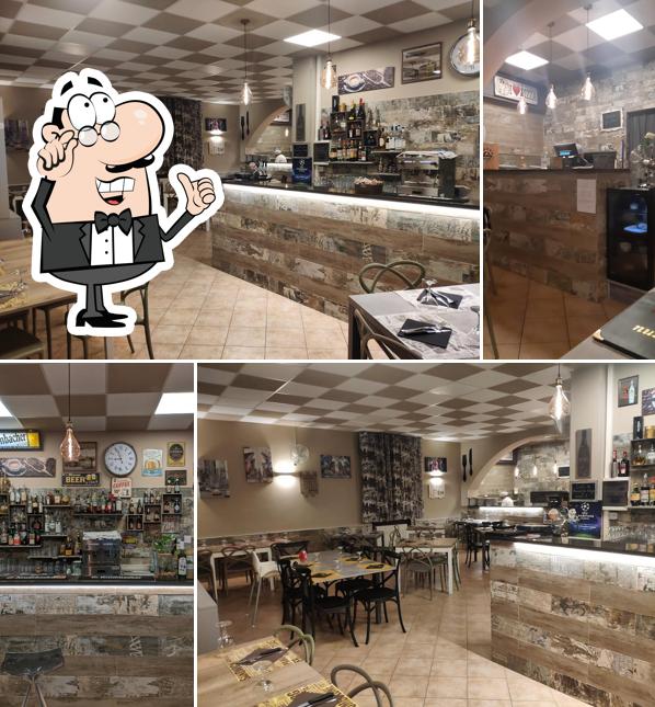 Dai un'occhiata agli interni di Happy Pizza