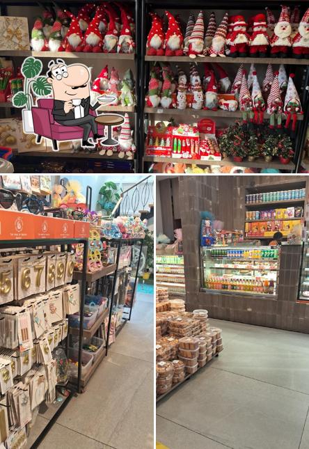 Take a seat at one of the tables at Cakes And Bakes