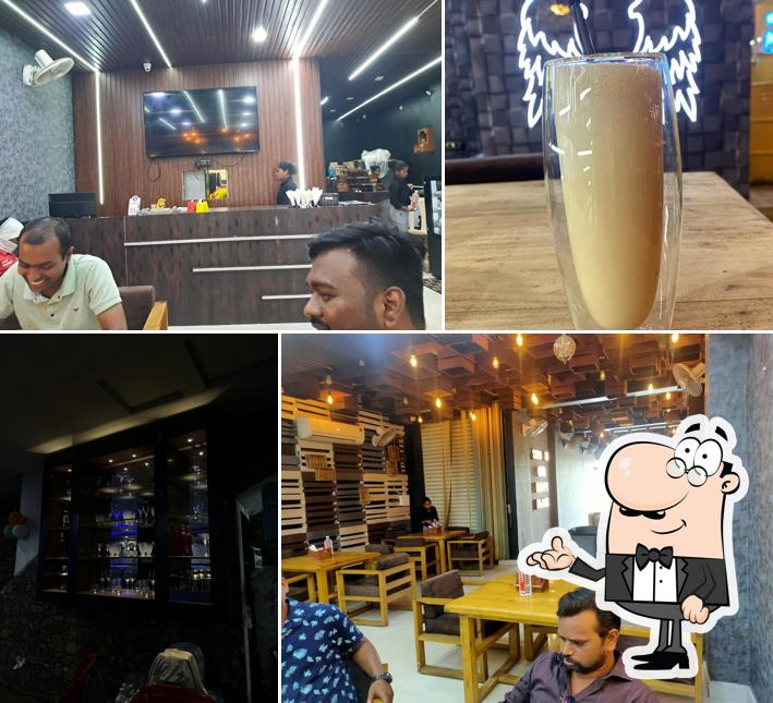 Take a seat at one of the tables at Aura