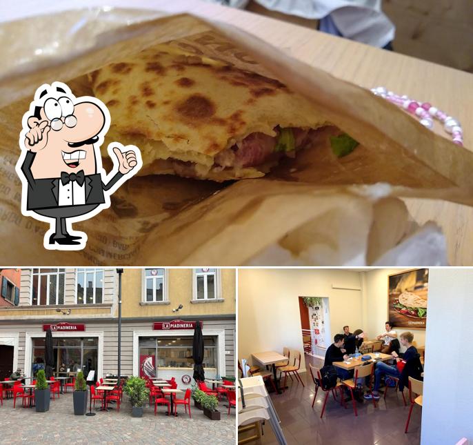 Questa è la immagine che presenta la interni e cibo di La Piadineria