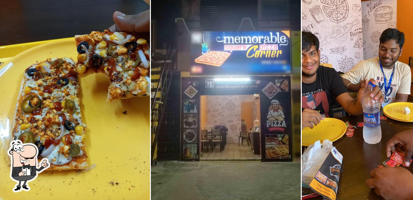 The interior of MEMORABLE SQUARE PIZZA CORNER