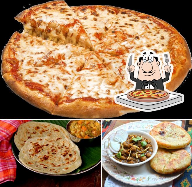 Pick pizza at Tejas Fast Food